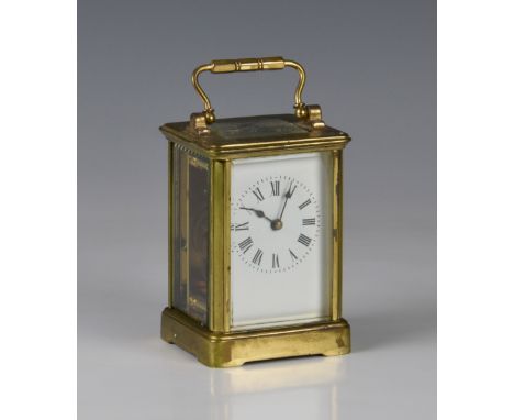 A French gilt brass carriage clock, first half 20th century, single train movement, Roman white enamel dial, corniche case, 4