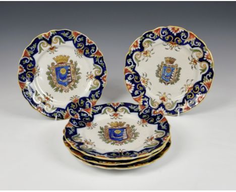 A set of five 19th century faience plates each hand painted with central "Granville" coat of arms and stylised floral decorat