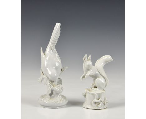 Two white glazed Meissen bird and squirrel figures, modern, the bird, underglaze blue crossed sword mark, incised mark includ
