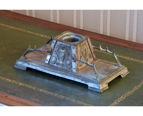 An Art Nouveau plated copper and brass desk stand early 20th century, the central inkwell with a stylised own to each side in