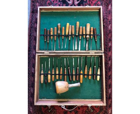 A cased collection of vintage carpenter's / wood turners chisels,&nbsp;various maker's, some with retailers label 'AFRICAN TO