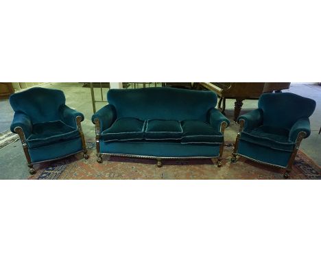 A Chippendale Style Mahogany Framed Three Piece Lounge Suite, Comprising of a three seater sofa and a pair of armchairs, upho