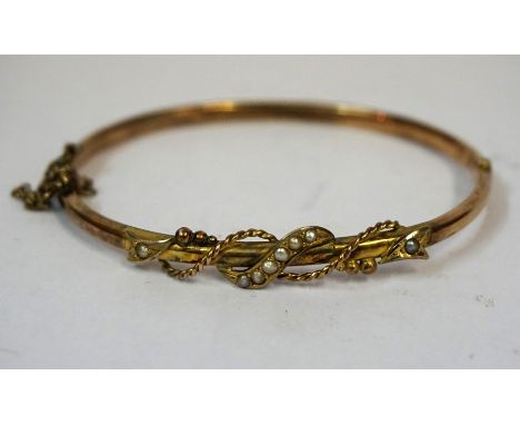 A 9ct Gold and Seed Pearl Bangle, Stamped 375, overall weight 4.5 grams