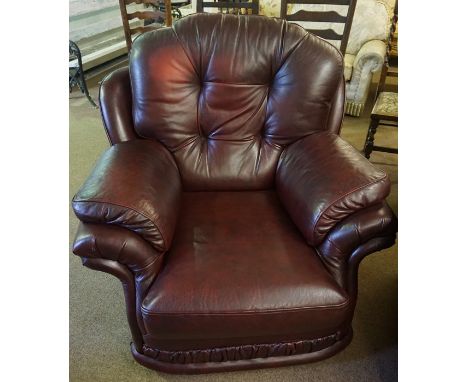 A Burgundy Leather Three Piece Lounge Suite, Comprising of a three seater sofa with pair of armchairs, sofa 90cm high, 191cm 