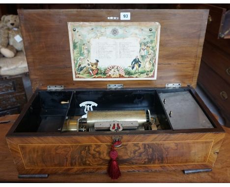 A Large Continental Walnut Cased Music Box, circa early 20th century, enclosing crank lever, change/repeat, stop/play switche