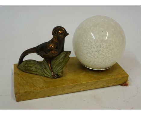 An Art Deco Desk Light, In the form of a bronzed bird with a mottled glass shade, raised on a marble plinth, 13cm high