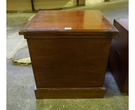 A Victorian Mahogany Commode, With hinged top enclosing a panelled interior, pine lined, with brass carry handles, 49cm high,