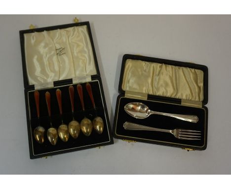 A Set of Six Silver Gilt and Red Guilloche Enamel Coffee Spoons, Hallmarks for Atkins bros Birmingham, in a fitted case, also