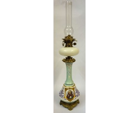 A Late Victorian Porcelain Oil Lamp by Hinks & Son, Decorated with portrait and floral panels, with glass reservoir and funne