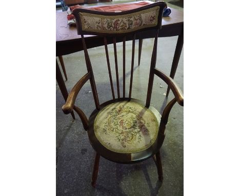 A Spindle Back Chair, With tapestry back rest and seat, 89cm high, also with an oak firescreen, (2)