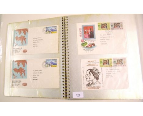A First Day Cover album of mainly Hong Kong commemoratives and definitives from 1970 - 75; high value definitives to $20 note
