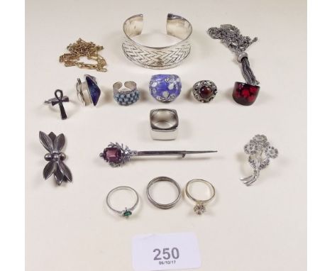 A small group of jewellery including silver bangle