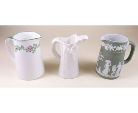 A Worcester leaf cream jug, Foley jug and Wedgwood green Jasperware jug