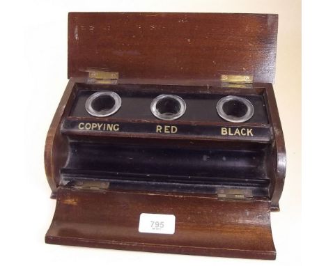 An oak cased desk stand and inkwell with ink pots 'Copying', 'Red', and 'Black'