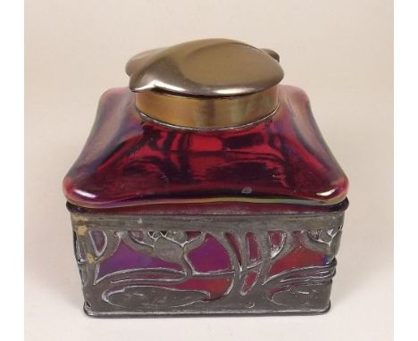 A French Art Nouveau pink lustred glass inkwell with brass lid and sinuous floral pierced pewter decoration - 8cm square - ma
