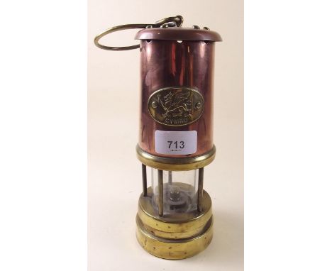 A Welsh copper and brass miners lamp
