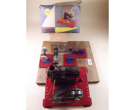 A 1950's Mamod static steam engine SE2 - boxed, and a grinding wheel etc mounted on board