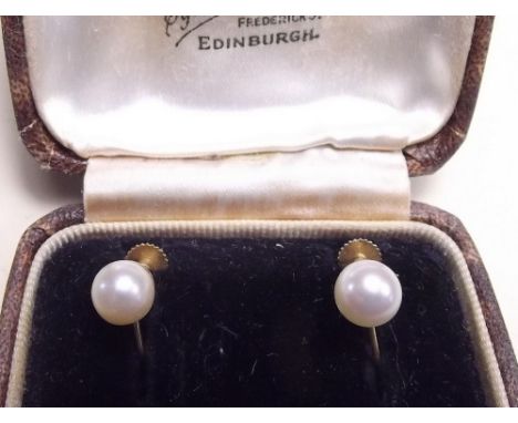 A pair of 9 carat gold and pearl earrings