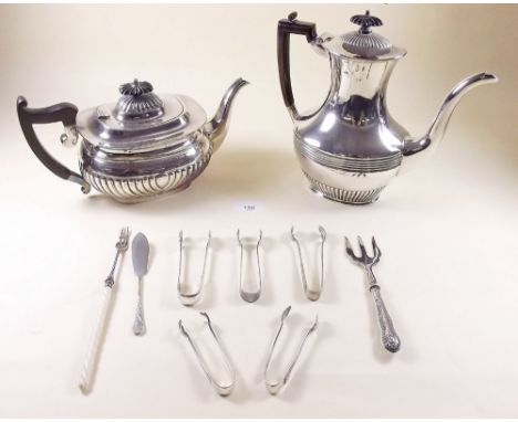 A silver plated teapot, coffee pot, toast rack and various cutlery