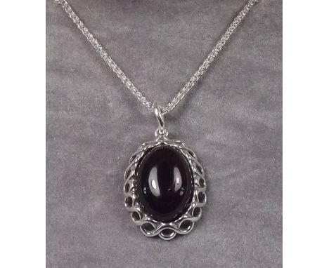 A silver cherry amber pendant and chain