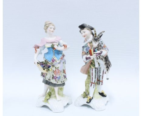 A pair of Sitzendorf porcelain male and female figures, (2) 19cm. 