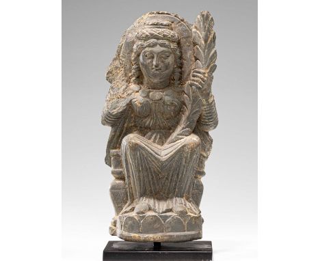 Grey SchistGandhara , 4th century Dimensions: Height 20 cm Wide 10 cm Depth 4 cm without baseWeight: 1411 grams with base  Ha
