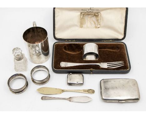 A collection of silver to include a Walker & hall Christening mug inscribed P.K Xmas 1931, along with silver Vesta case, silv
