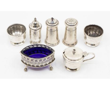 A collection of silver to include: a Georgian style reticulated navette shaped salt, on four ball and claw feet, by William H