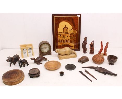 A collection of treen to include; A small Tsaki bamboo carved cup, a Sorrento large panel, a small Elliot clock with wooden c