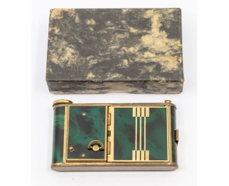 A vintage enamelled "Camera" constellation muscial compact with cigarette compartment, with dark green marble effect decorati