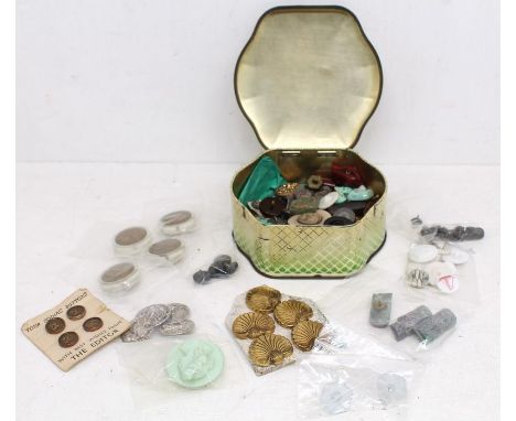 A collection of buttons to include: a set of three Art Nouveau silver buttons, the centres cast as Neptune holding a trident,