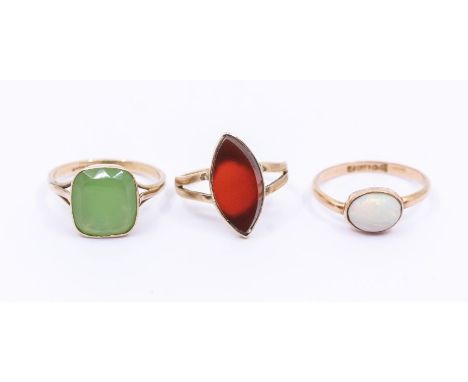 Three stone set 9ct gold rings, to include an opal and rose gold solitaire, (wear to setting some abrasions to opal) size R, 