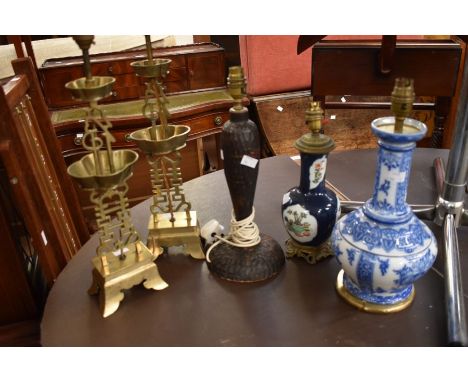 A collection of five Chinese lamp conversions, two vases, two brass, one wood and papier-mâché&nbsp;