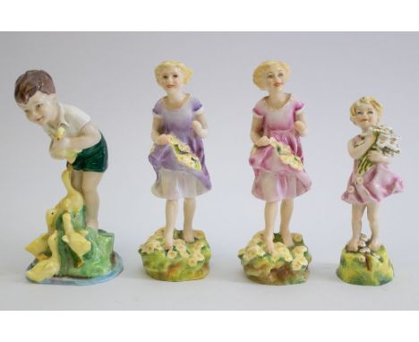 Four Royal Worcester figures, three young girls, and boy with ducklings