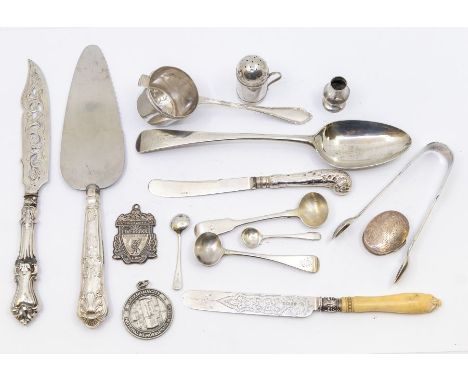 A collection of silver to include; a Georgian table spoon hallmarked for London 1786 by Hester Bateman, a pair of sugar tongs