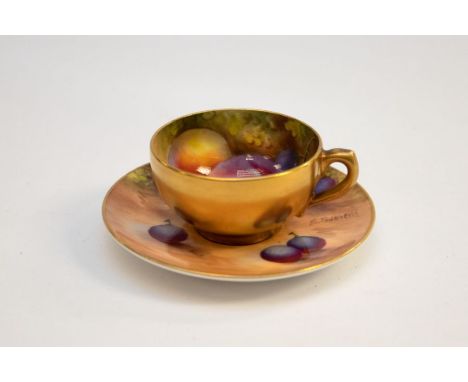 A Royal Worcester cabinet cup and saucer, painted by H. Bee and E. Townsend, with peaches, grape patterns. Marks to base.Slig