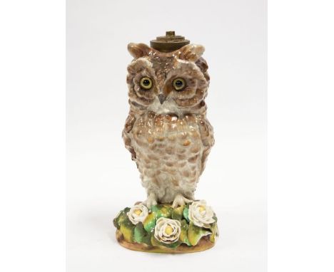A Victorian porcelain oil lamp in the form of an owl; in the manner of Moore Bros, lozenge kite mark to basechipping to leave