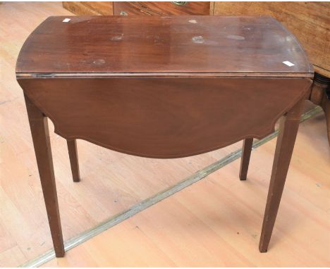 A George III mahogany drop-leaf occasional table with a single drawer, together with a George III bow-fronted chest of drawer