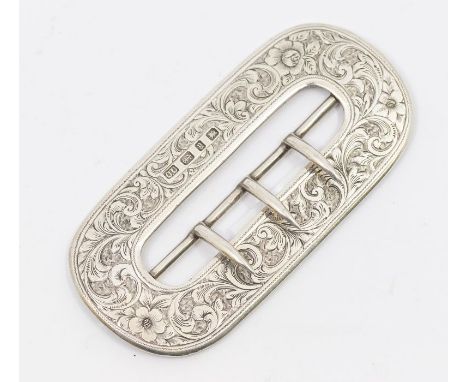A late Victorian silver oval shaped buckle, engraved flower and foliage decoration, hallmarked, Birmingham, 1898, by Colen He