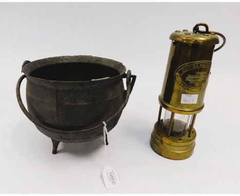 A brass Miners Lamp, along with a cast-iron Pot