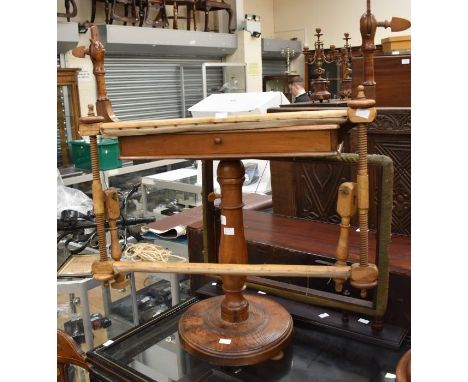 A light oak 19th Century tapestry work frame on round pedestal base