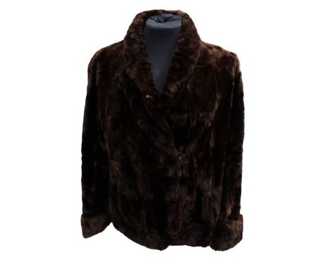 A Moleskin short fur jacket, which is late 1940s to early 1950s.&nbsp;The jacket has a small rolled collar, and turned back c
