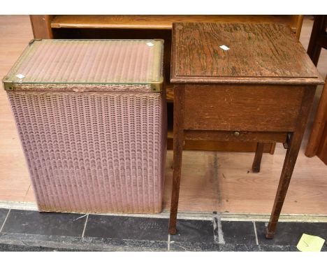 A wicker linen basket, together with an oak sewing table, a small side table, a 19th century toilet mirror, standard lamp and