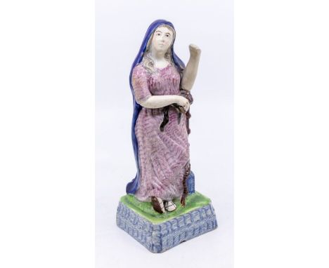 A Prattware figure of Hope, c.1800-1820. Size: approx. 21cm high.Condition: Left arm replaced, top section of anchor missing;