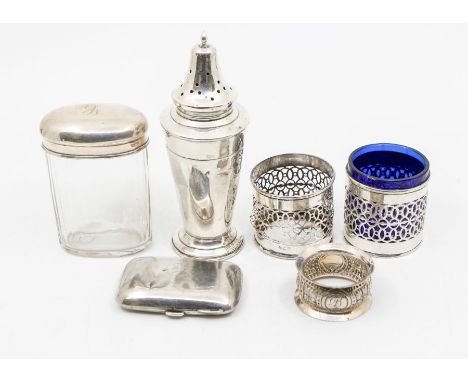 A collection of early 20th Century silver to include: tapering cylindrical caster with domed cover (filled); oval shaped glas