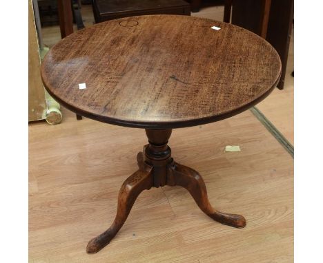 A George III round-top tripod table in oak, together with a late Georgian mahogany drop-leaf sewing table and a reproduction 