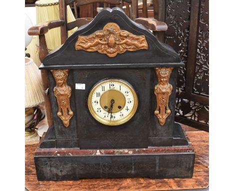 A large Victorian slate mantle clock