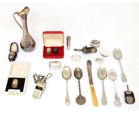 A collection of silver to include: two 20th Century silver thimbles, hallmarked, in fitted cases; a 1935 novelty spoon with g