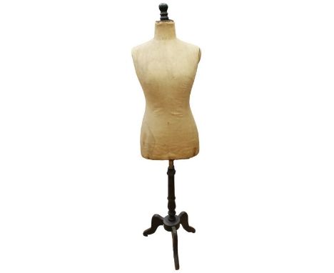 A vintage early 1900’s tailors dummy with a black wooden top and stand, and tripod legs.Size: approximately 153cm height.Cond