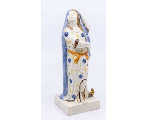 A Staffordshire Prattware figure of 'Hope', 1800, on a square base. Size: approx. 20cm highCondition: The rear section of the